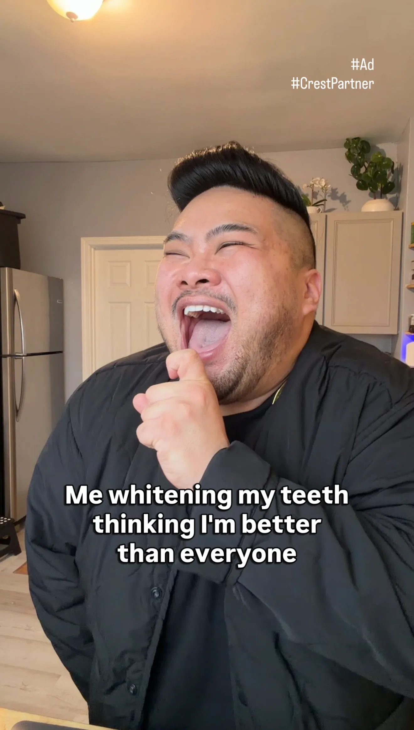 I laugh beneath text about whitening my teeth in a paid Crest campaign.