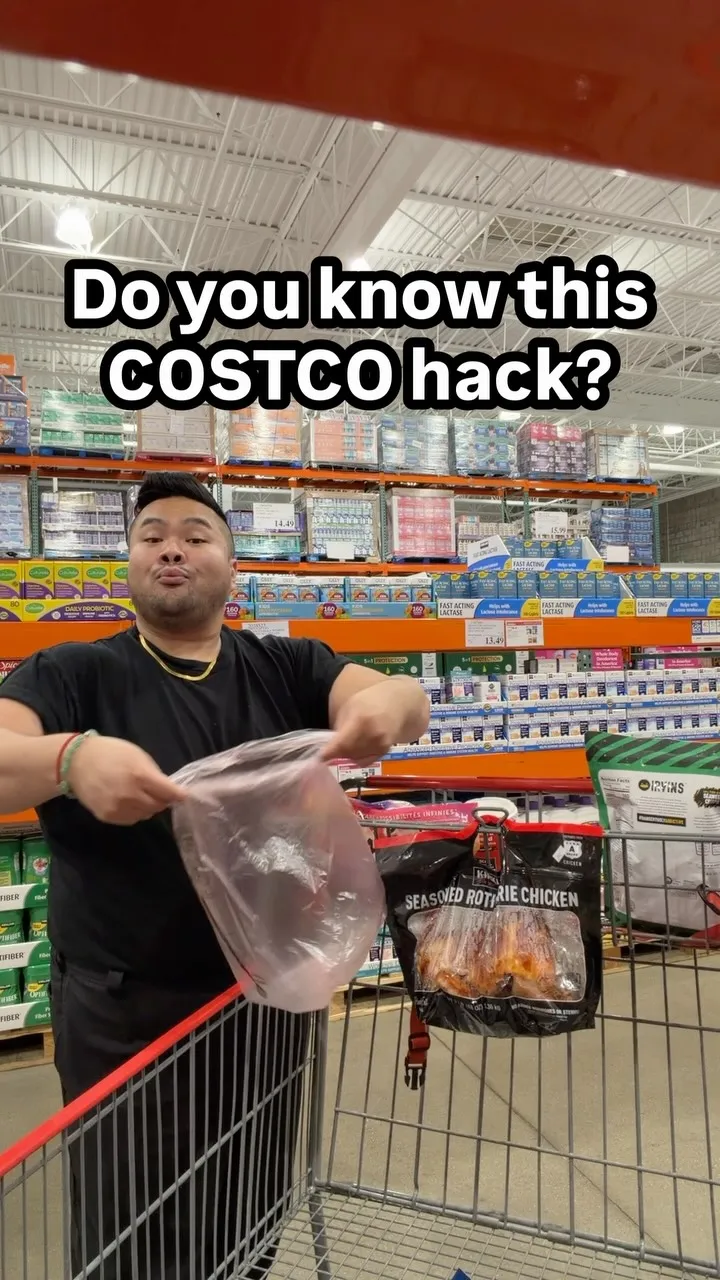 RV Mendoza demonstrating how he carries a Costco rotisserie chicken in a bag.