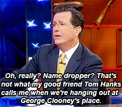 Stephen Colbert jokes about name-dropping while mentioning Tom Hanks and George Clooney.