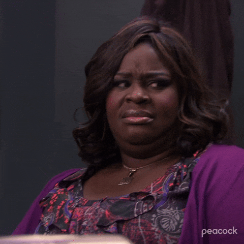 A woman gives a skeptical side-eye.