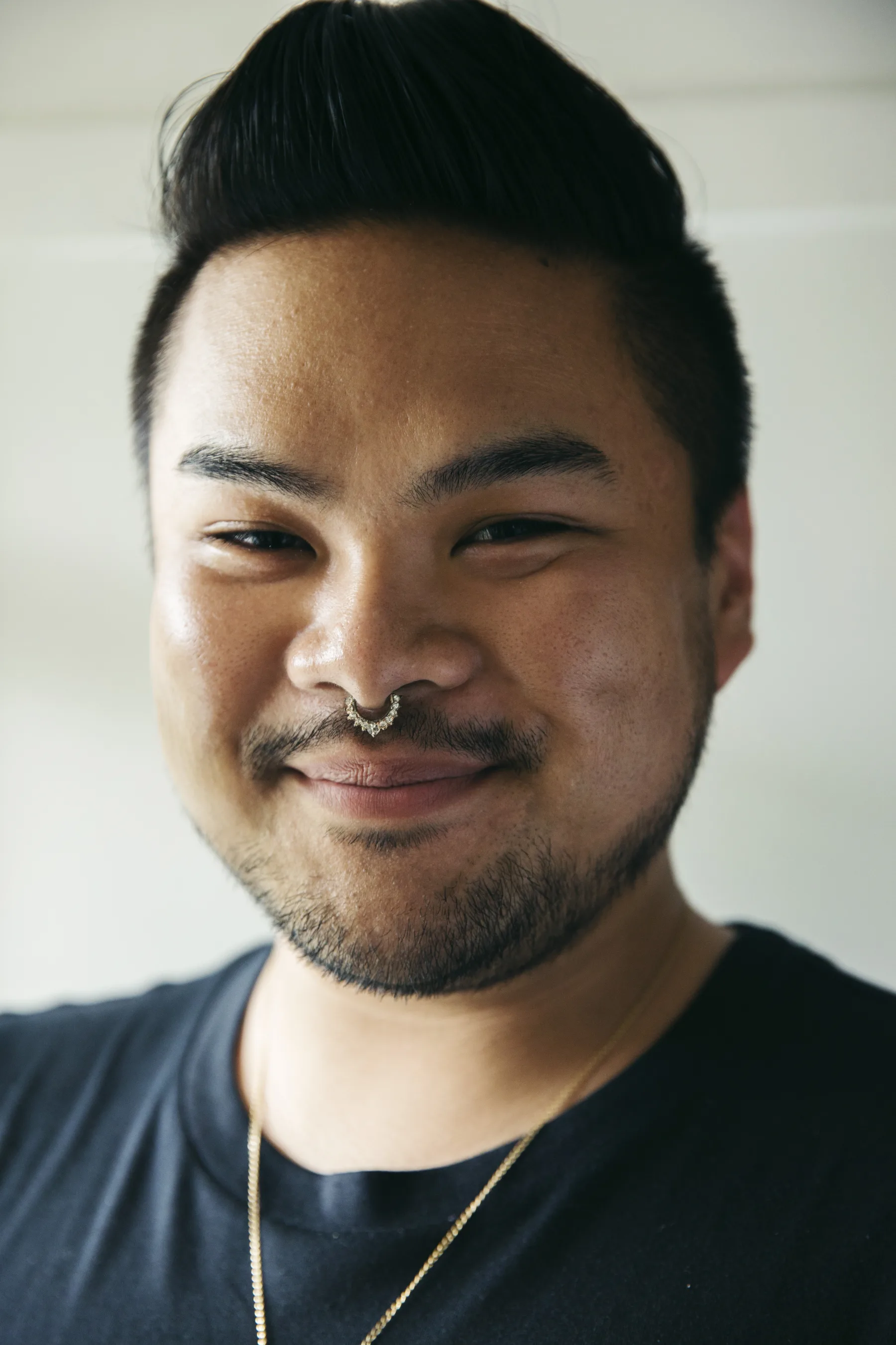 RV Mendoza posing for a studio portrait.